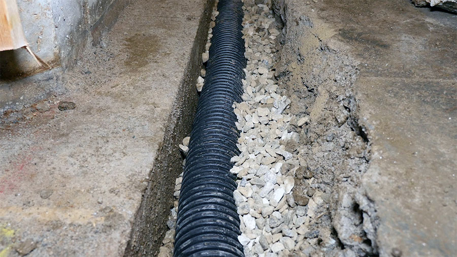 foundation contractor doing drain tiles works