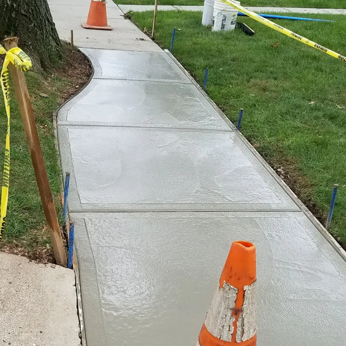 foundation Contractor doing concrete sidewalks works